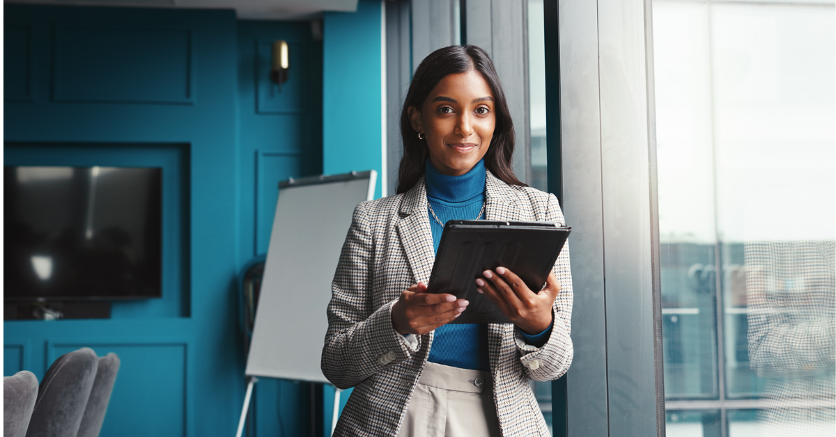 Woman holding a tablet device